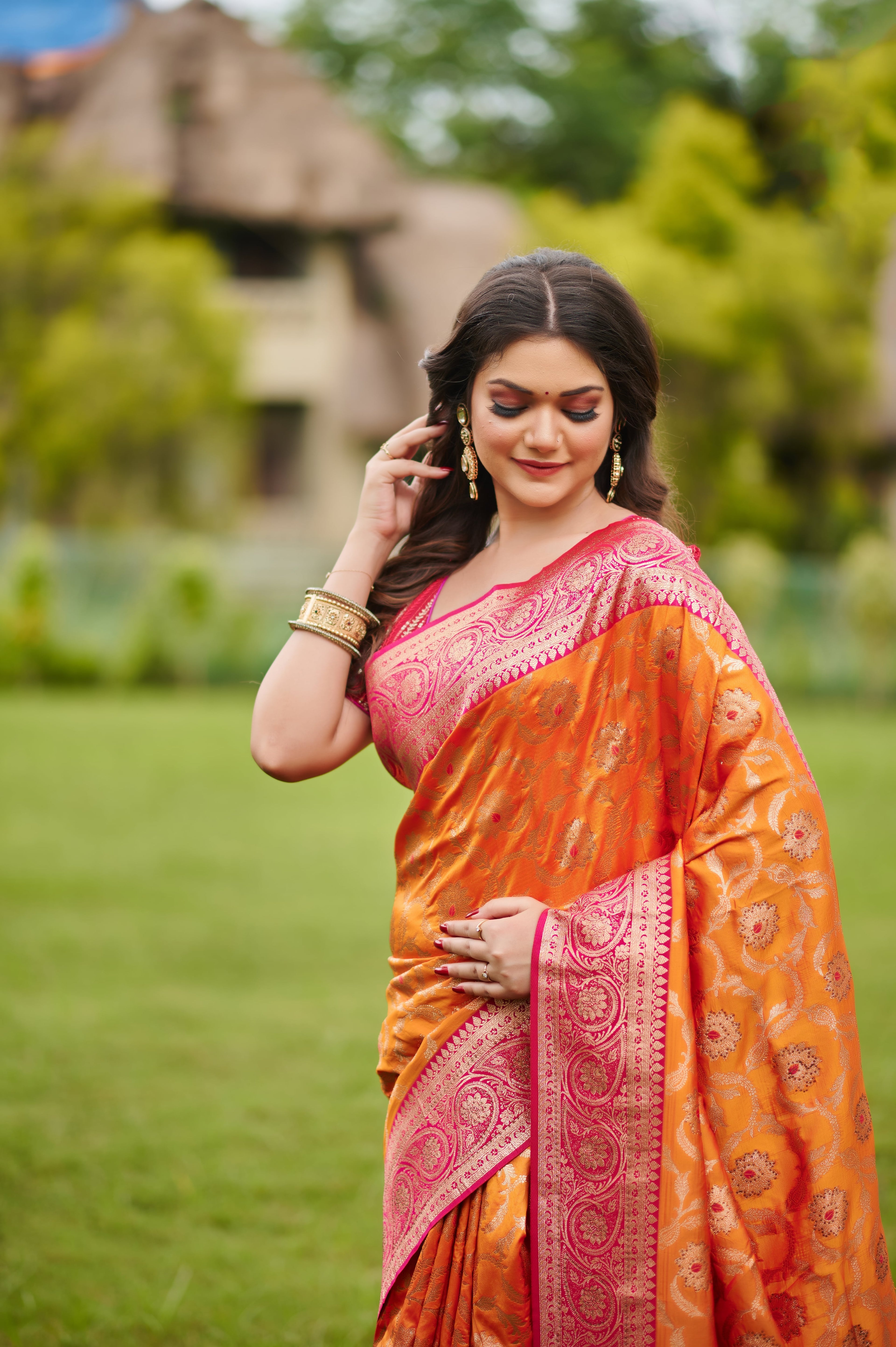 Fiery Orange-Pink Banarasi Silk Saree with Gold Zari Weave