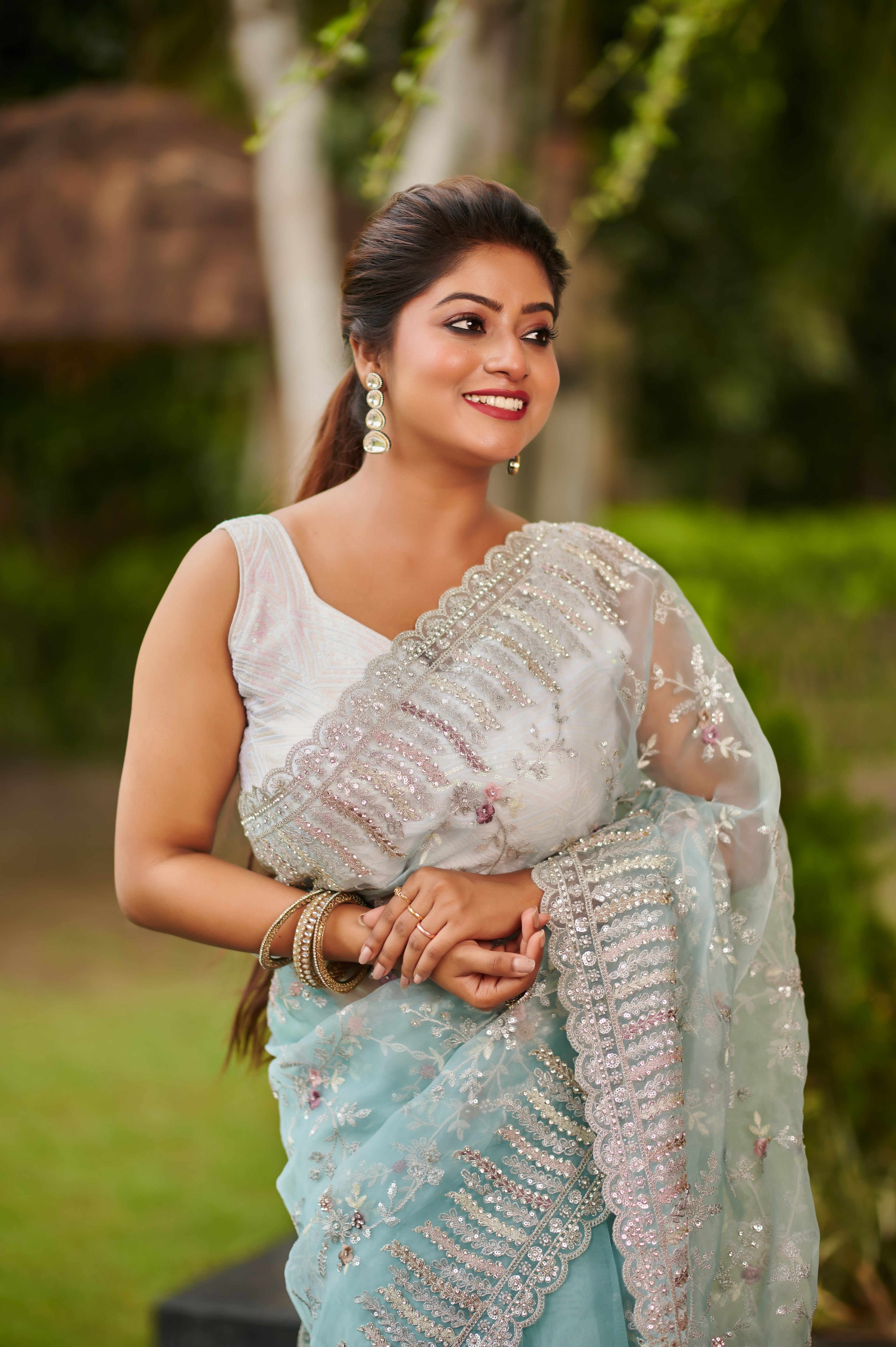 Icy Blue Net Saree with Silver Sequin & Floral Embroidery