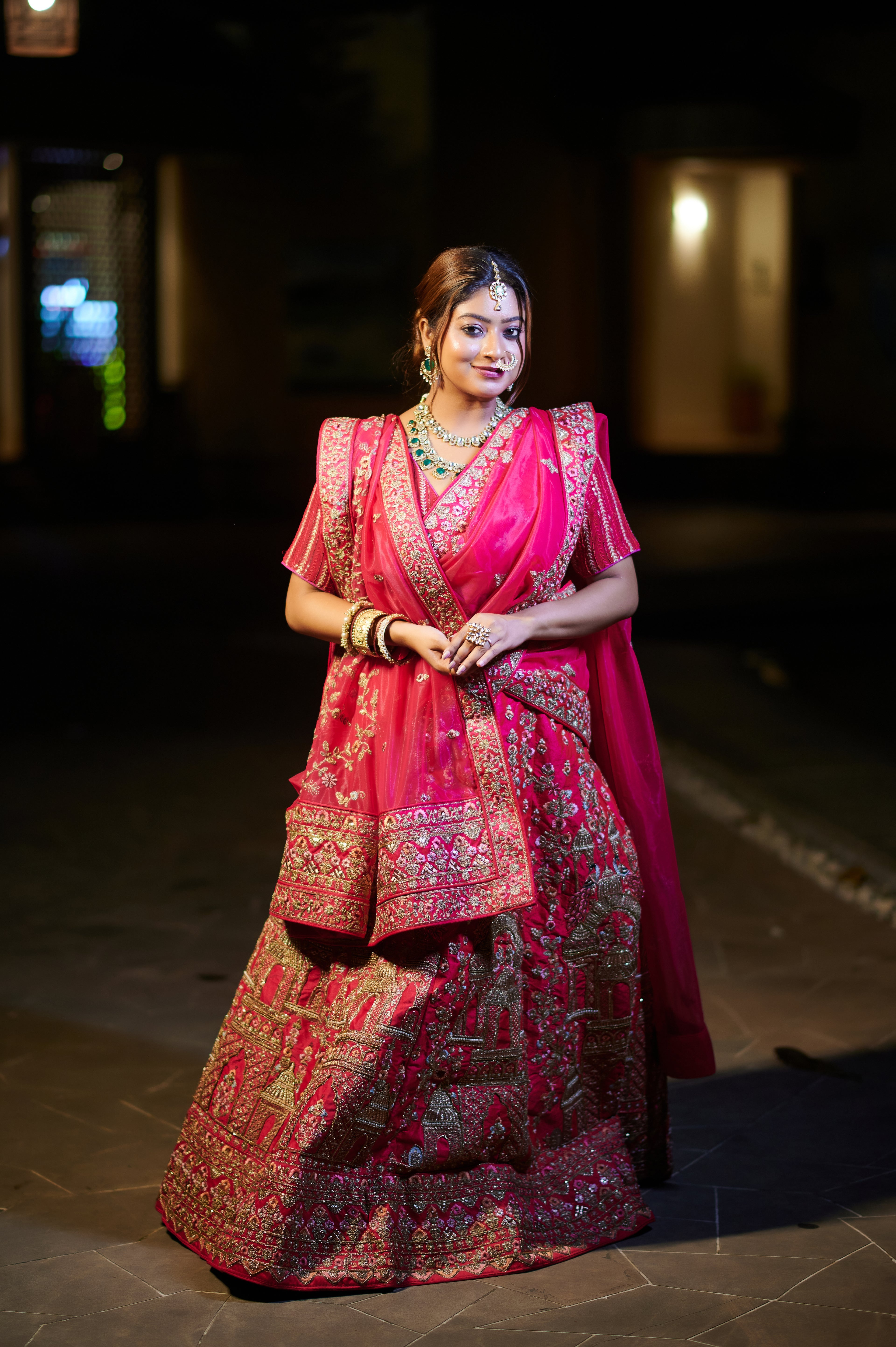 Rasika – Regal Pink Bridal Lehenga with Temple Motif Embroidery