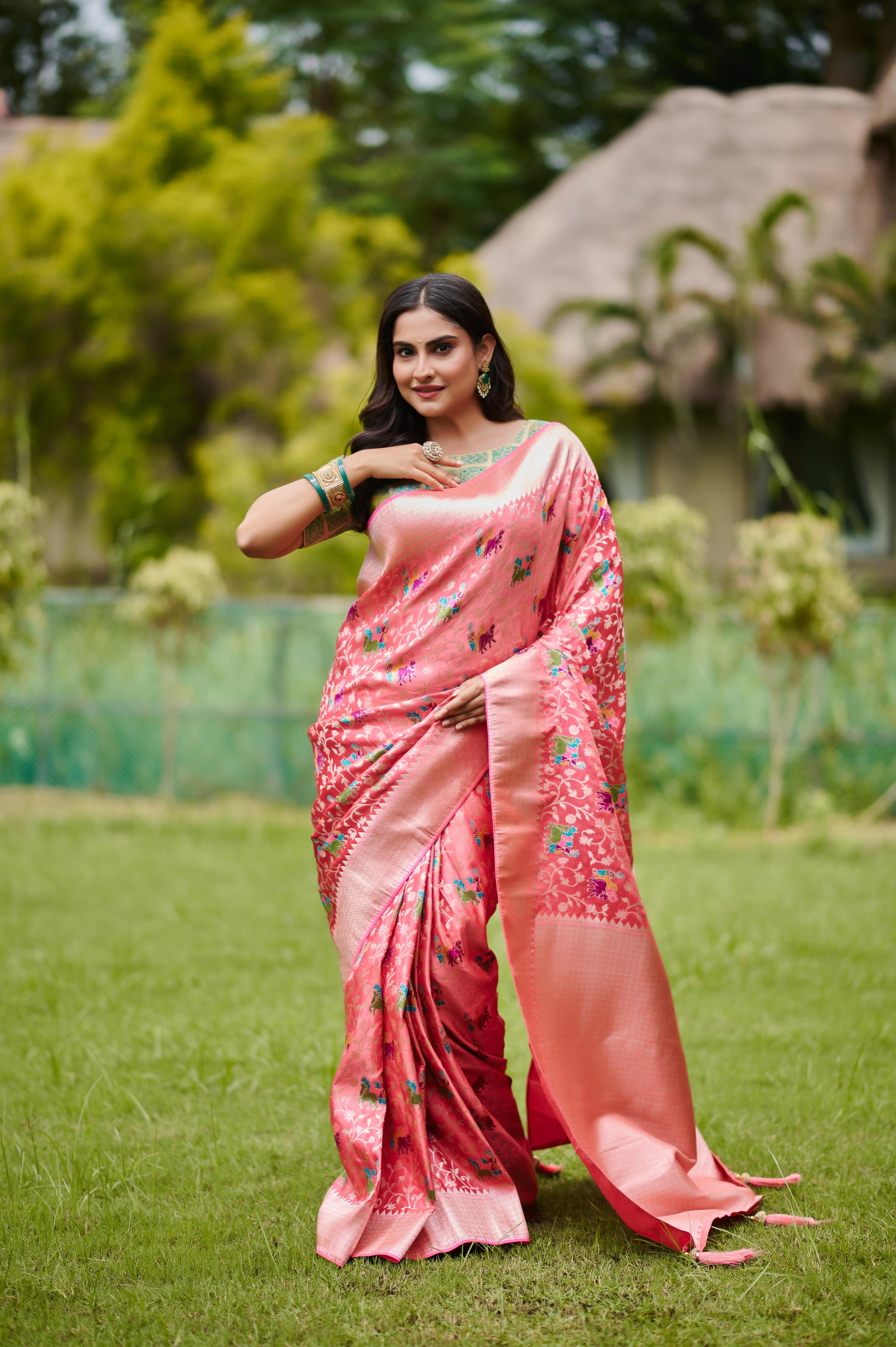 Elegant Coral Pink Banarasi Silk Saree with Elephant Motifs