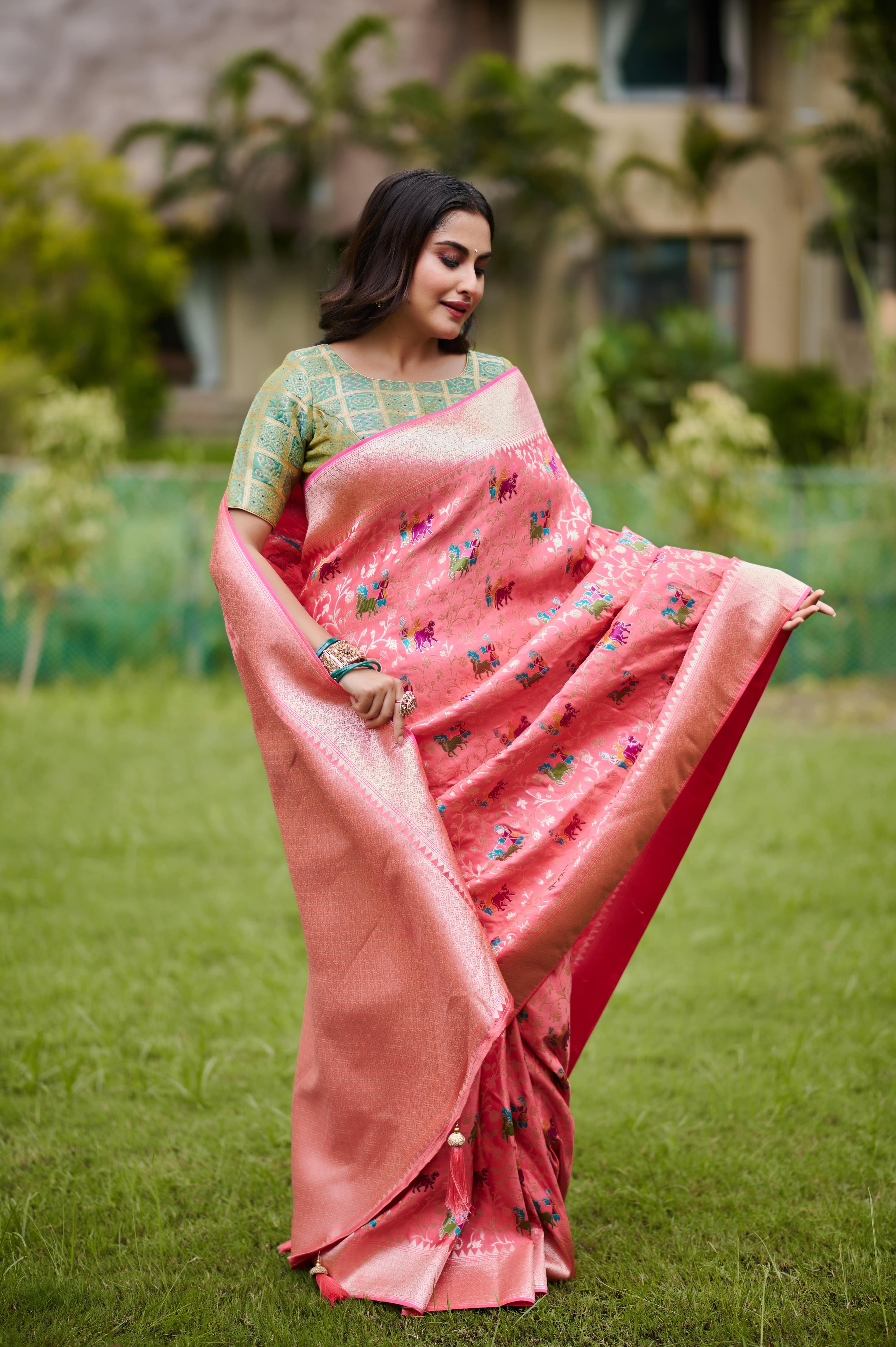 Elegant Coral Pink Banarasi Silk Saree with Elephant Motifs