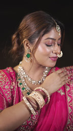 Rasika – Regal Pink Bridal Lehenga with Temple Motif Embroidery